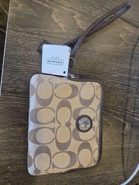Coach Signature C Wristlet in Tan and Dark Brown